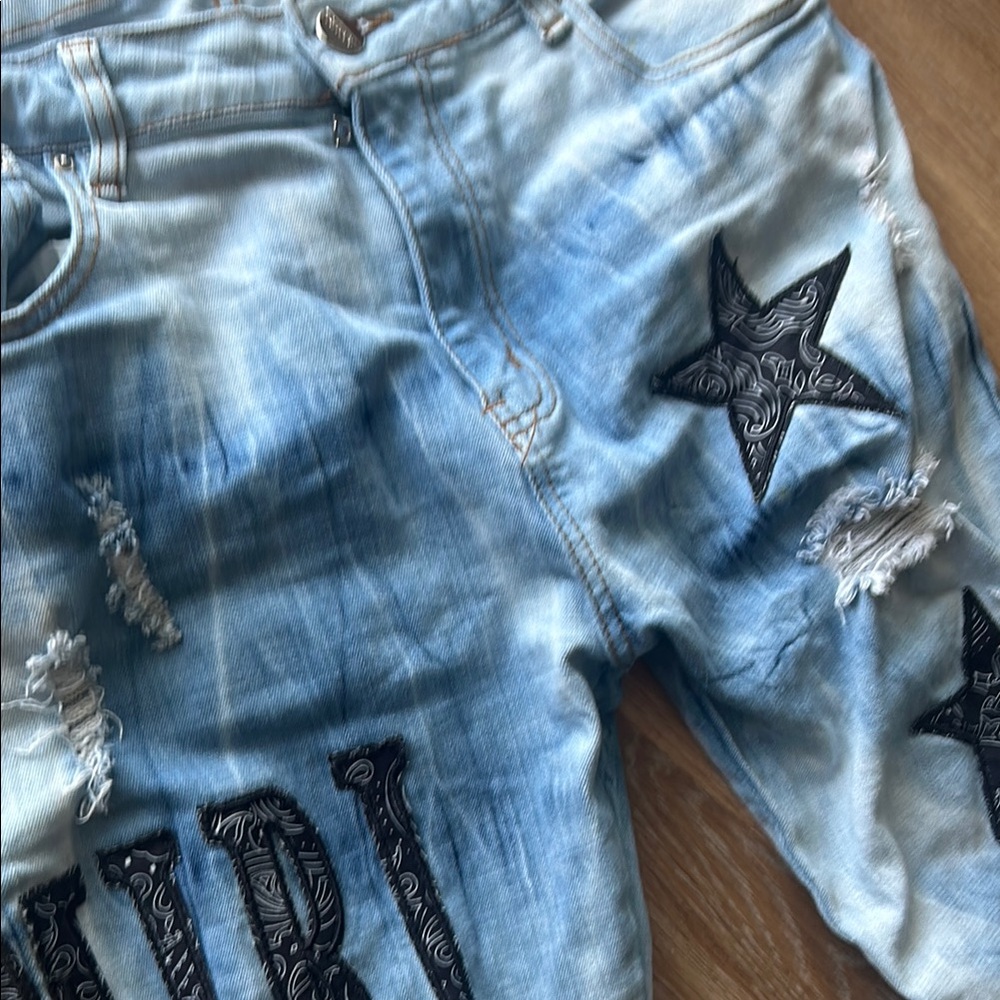 AMIRI Faded Blue Denim Jeans